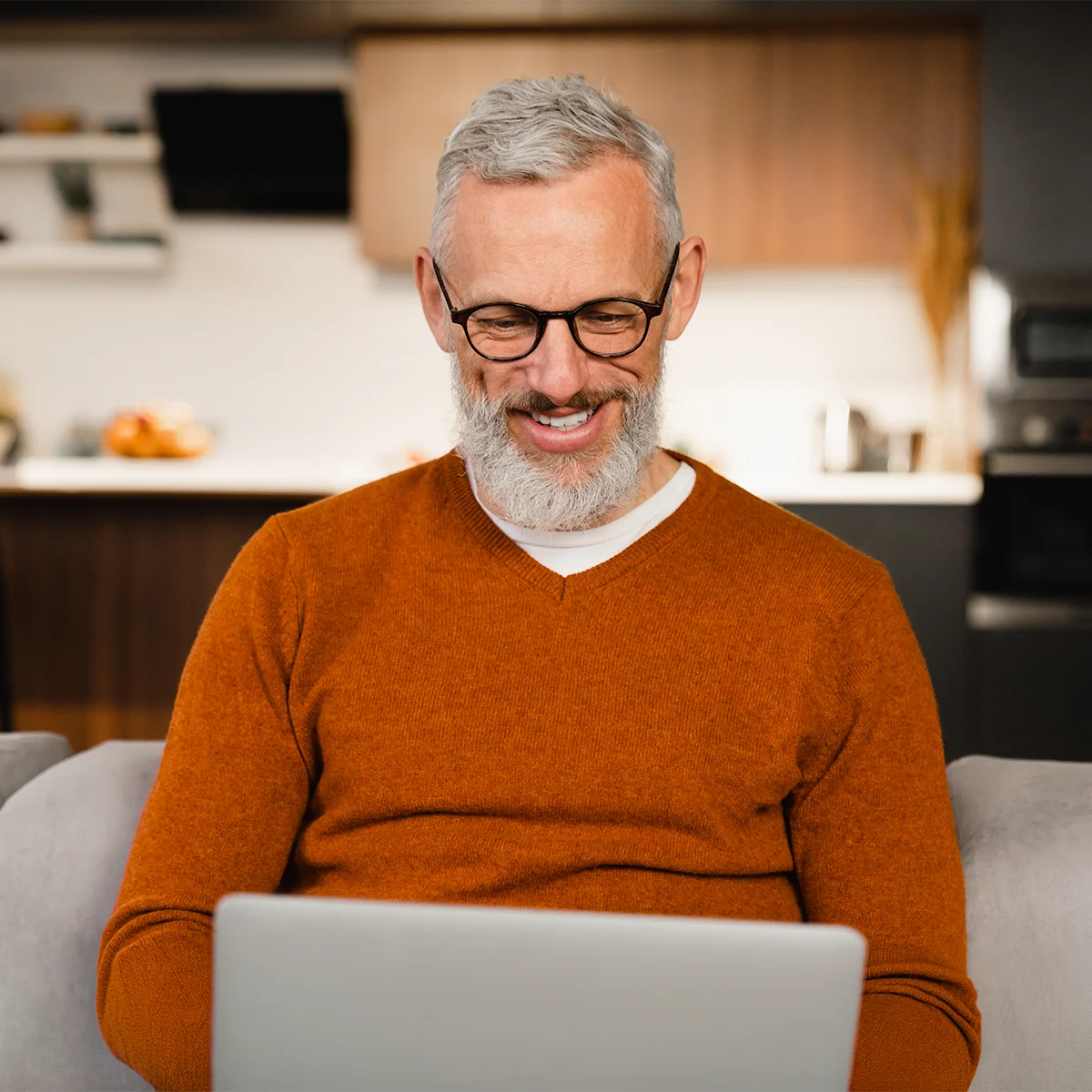 older man utilizing online financial training
