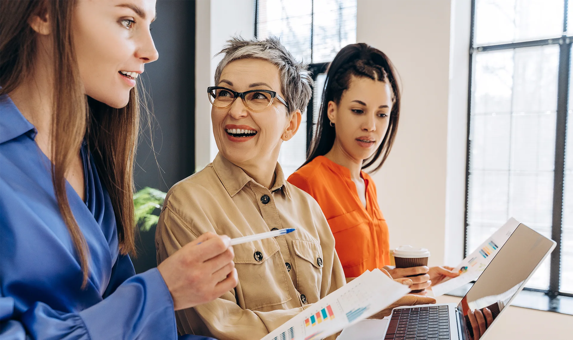 female financial advisor assisting client in meeting