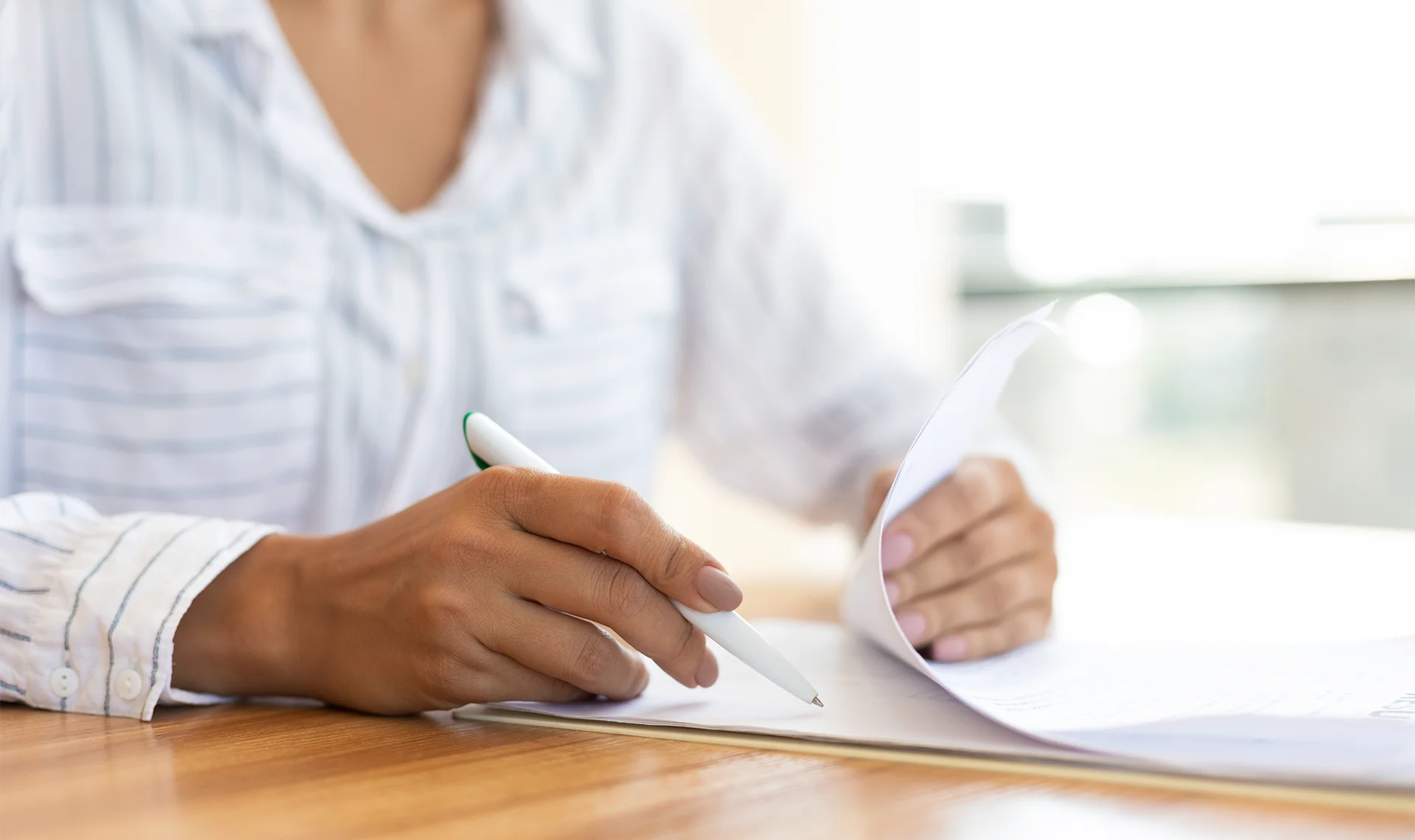 employer filling out financial forms for team