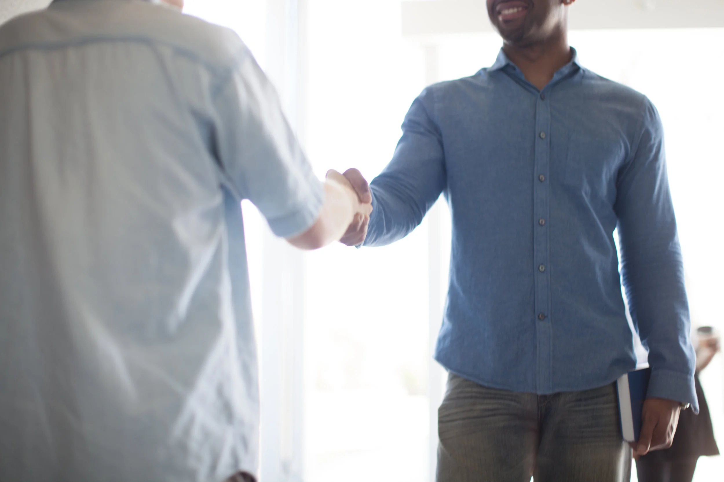 men shaking hands
